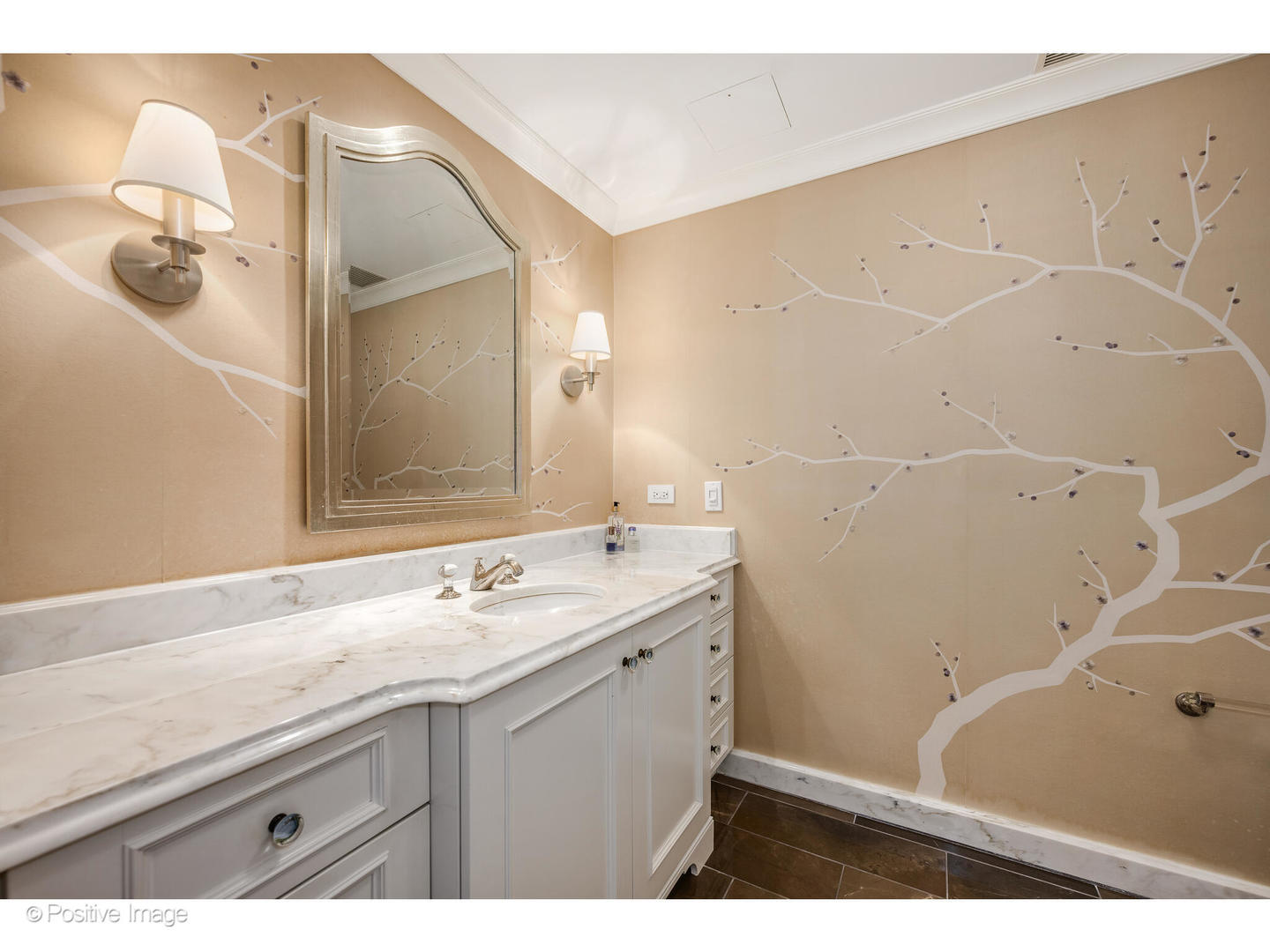 161 East Chicago Avenue, Unit 54A Chicago, IL 60611 - Photo 33 of 41 a bathroom with a sink and mirror
