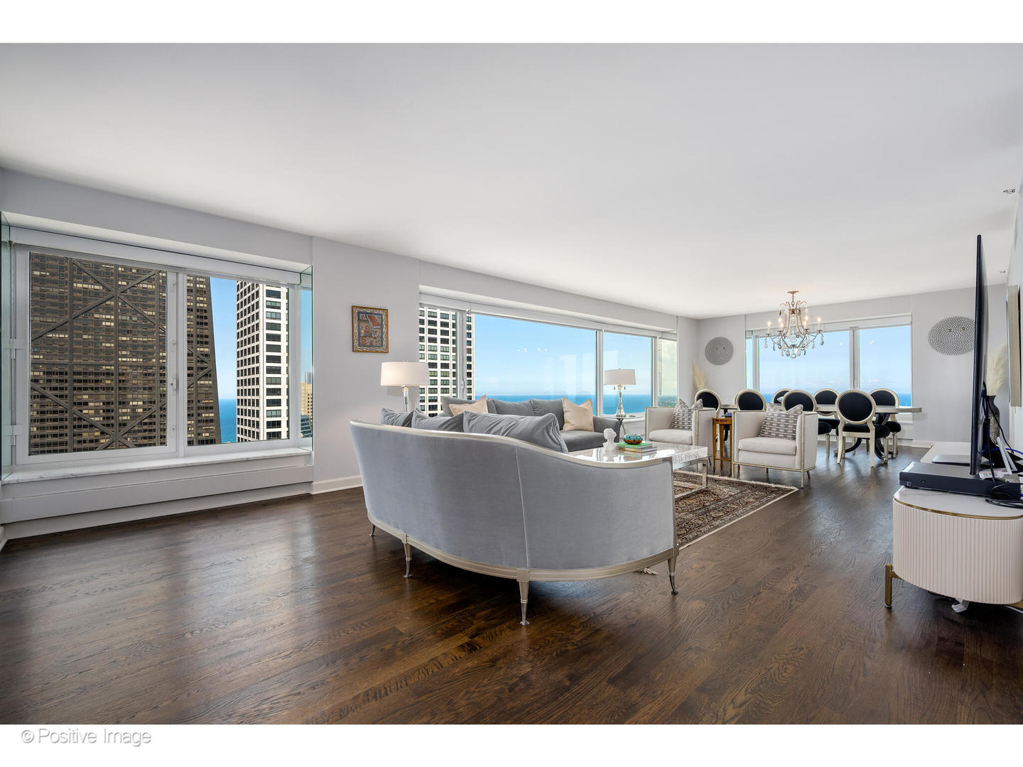 161 East Chicago Avenue, Unit 54A Chicago, IL 60611 - Photo 4 of 41 a living room with furniture and a large window