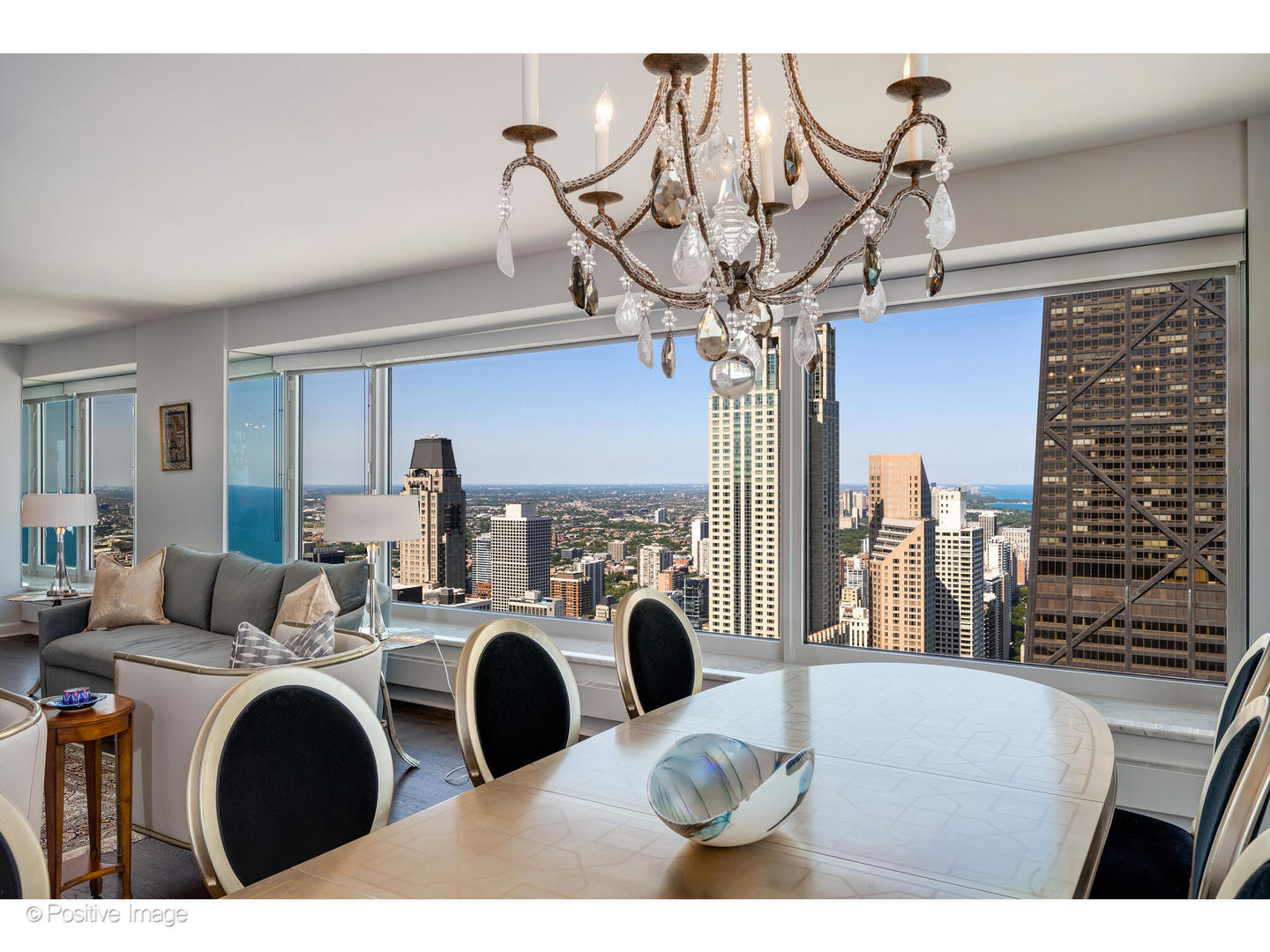 161 East Chicago Avenue, Unit 54A Chicago, IL 60611 - Photo 10 of 41 a view of living room with furniture and chandelier