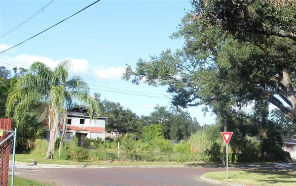 a sign board with street view