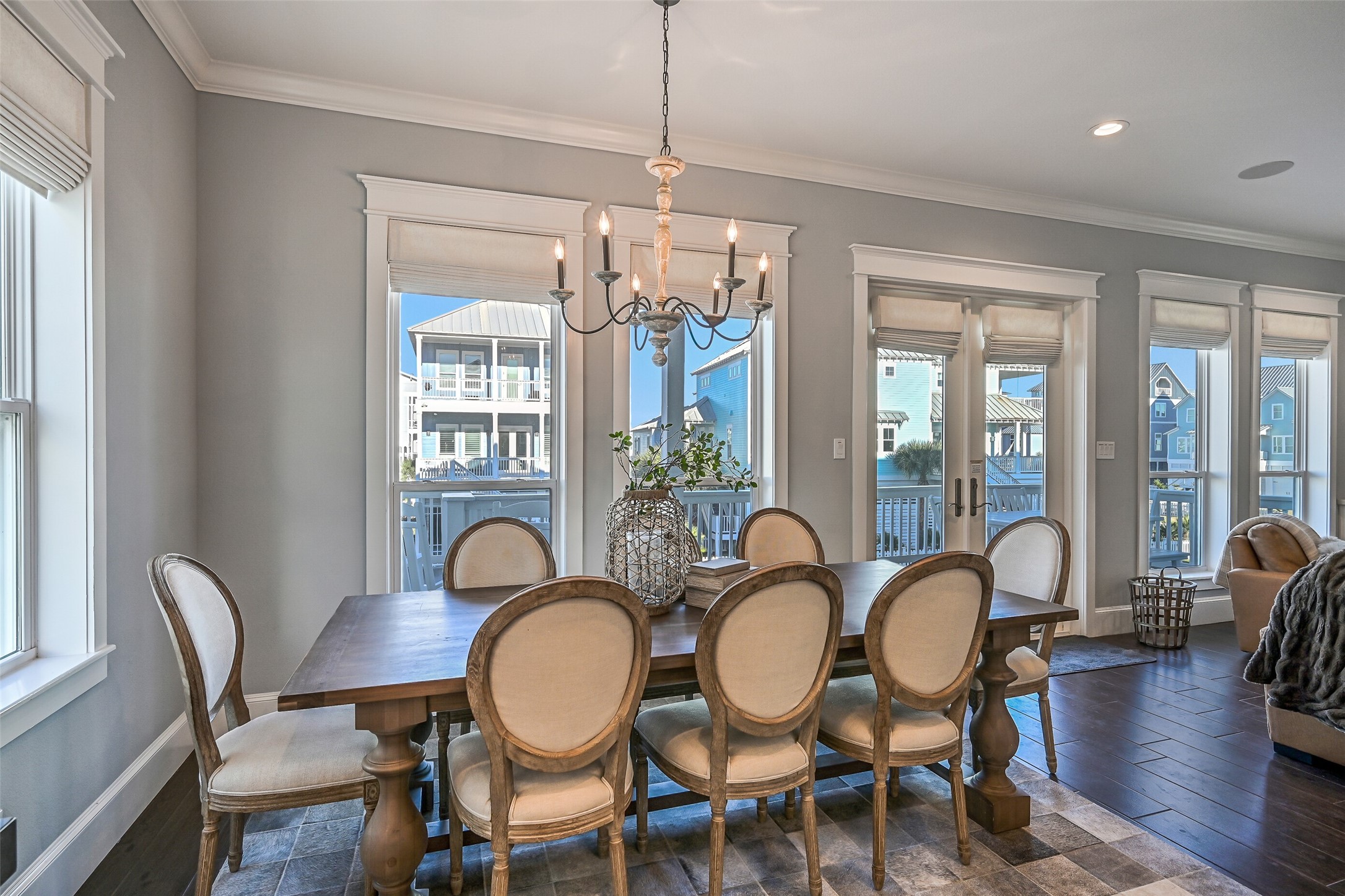 3839 Periwinkle Galveston, TX 77554 - Photo 12 of 49 A generously sized dining room provides comfortable space for a table seating up to eight guests.