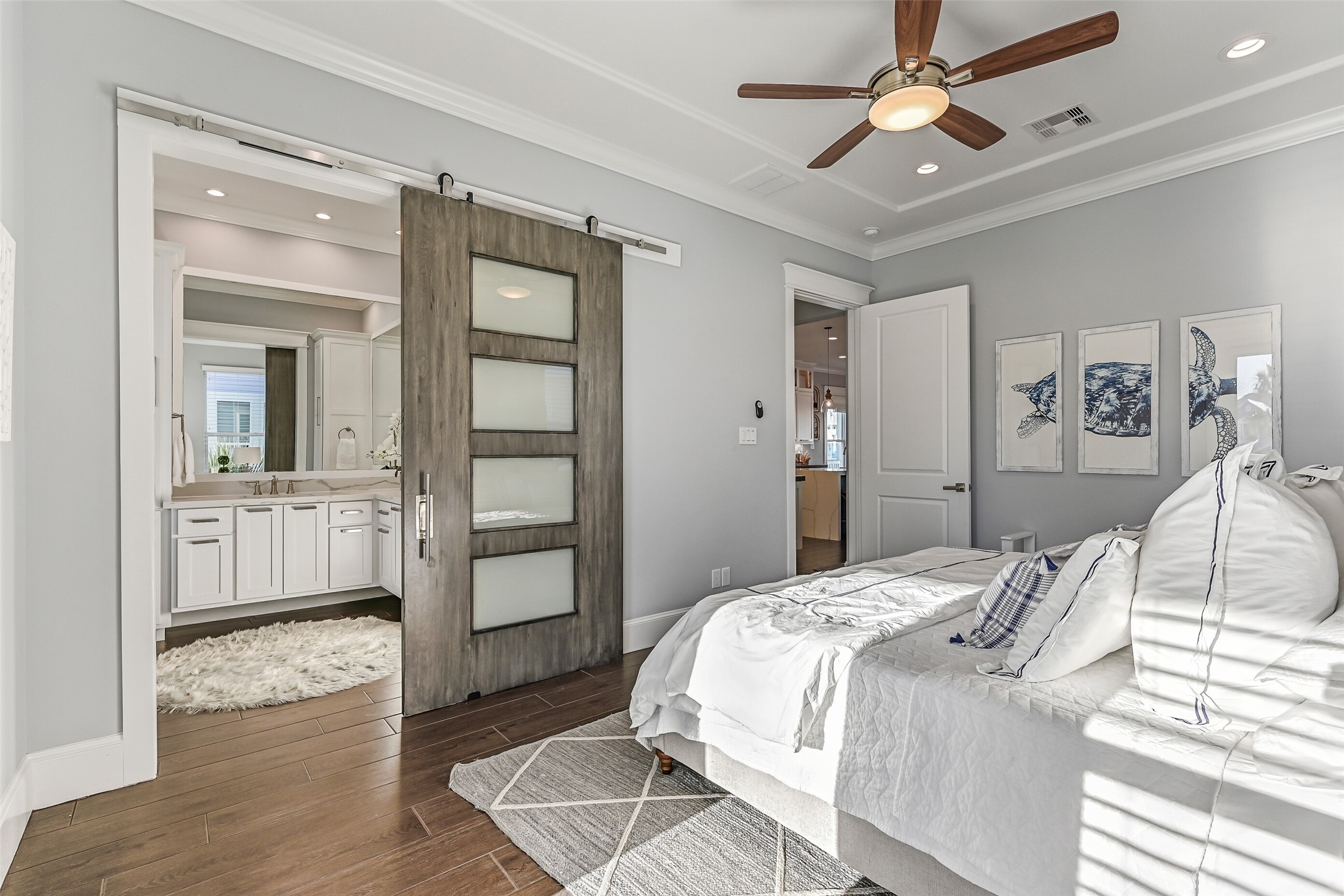 3839 Periwinkle Galveston, TX 77554 - Photo 21 of 49 Through the doors you will find and expansive en-suite bath and walk-in closet.