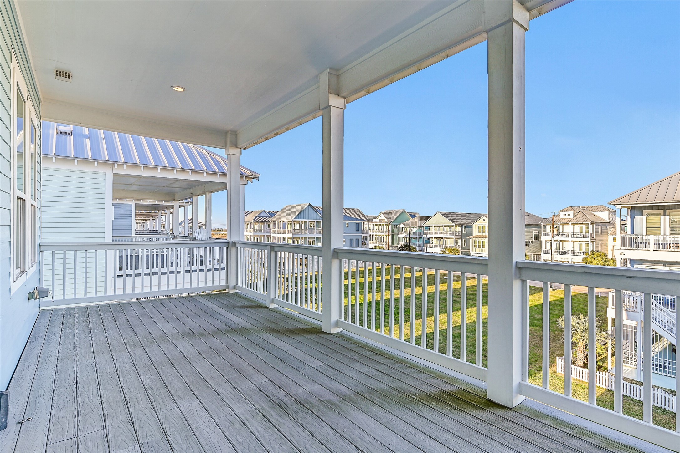 3839 Periwinkle Galveston, TX 77554 - Photo 32 of 49 The 2nd floor east facing covered porch off of the family room.
