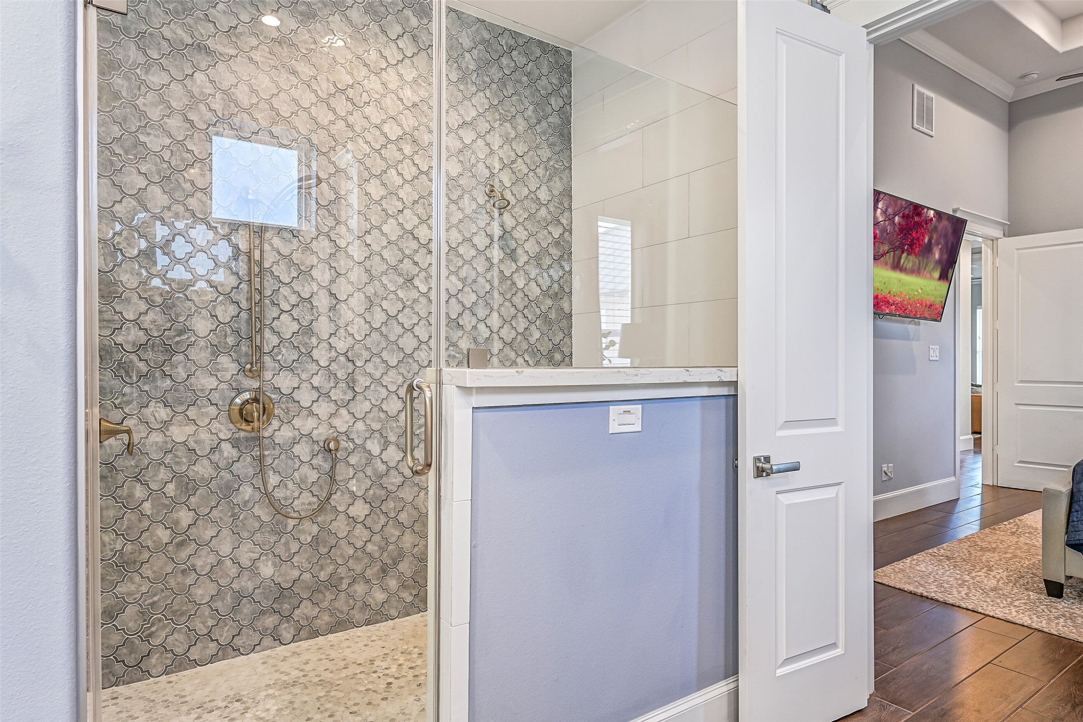 3839 Periwinkle Galveston, TX 77554 - Photo 44 of 49 The walk-in shower is complete with double shower heads.