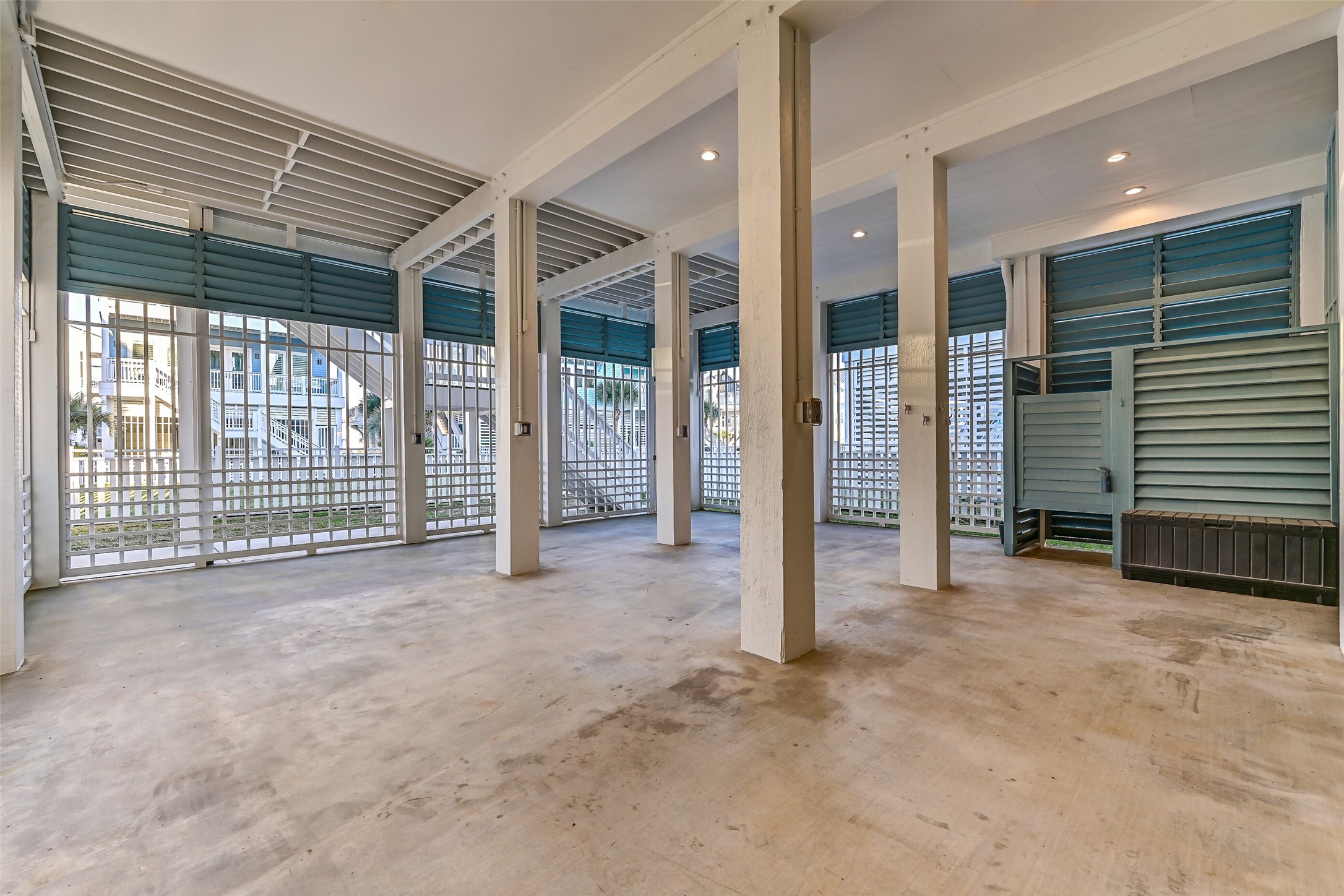 3839 Periwinkle Galveston, TX 77554 - Photo 45 of 49 The ground floor offers an outdoor shower and plenty of space for parking, storage, and entertaining.