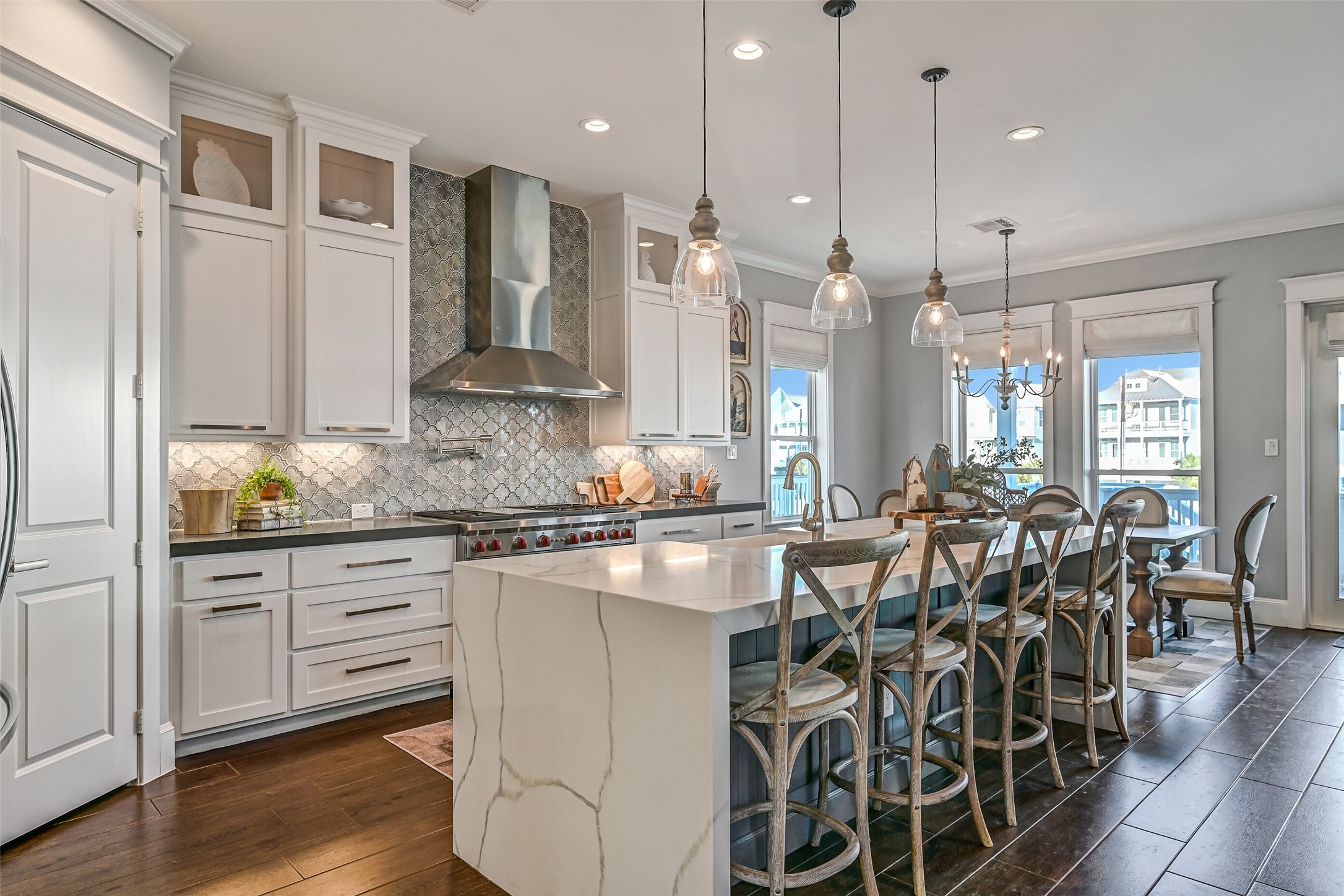 3839 Periwinkle Galveston, TX 77554 - Photo 5 of 49 As you enter the home, you are immediately welcomed into an open-concept kitchen, living, and dining area.