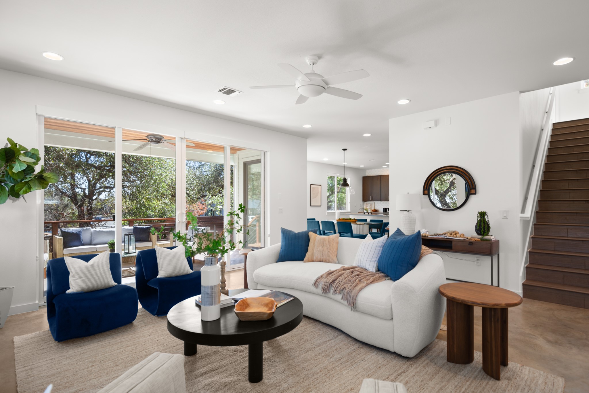 The living room leads to the back deck for easy indoor/outdoor living