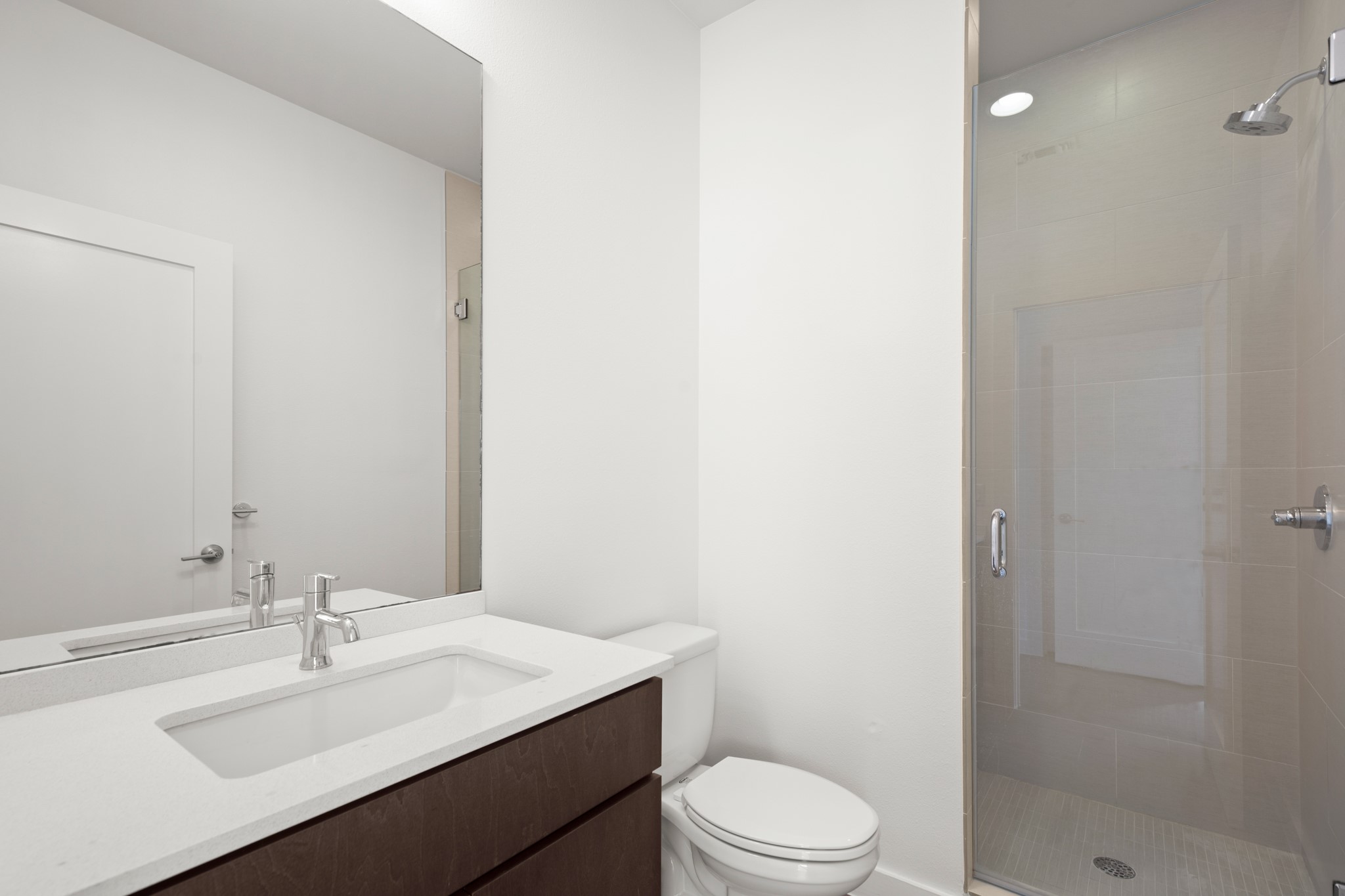 4111 Spicewood Springs Road, Unit 1 Austin, TX 78759 - Photo 19 of 31 Crisp, clean, and modern secondary bathroom