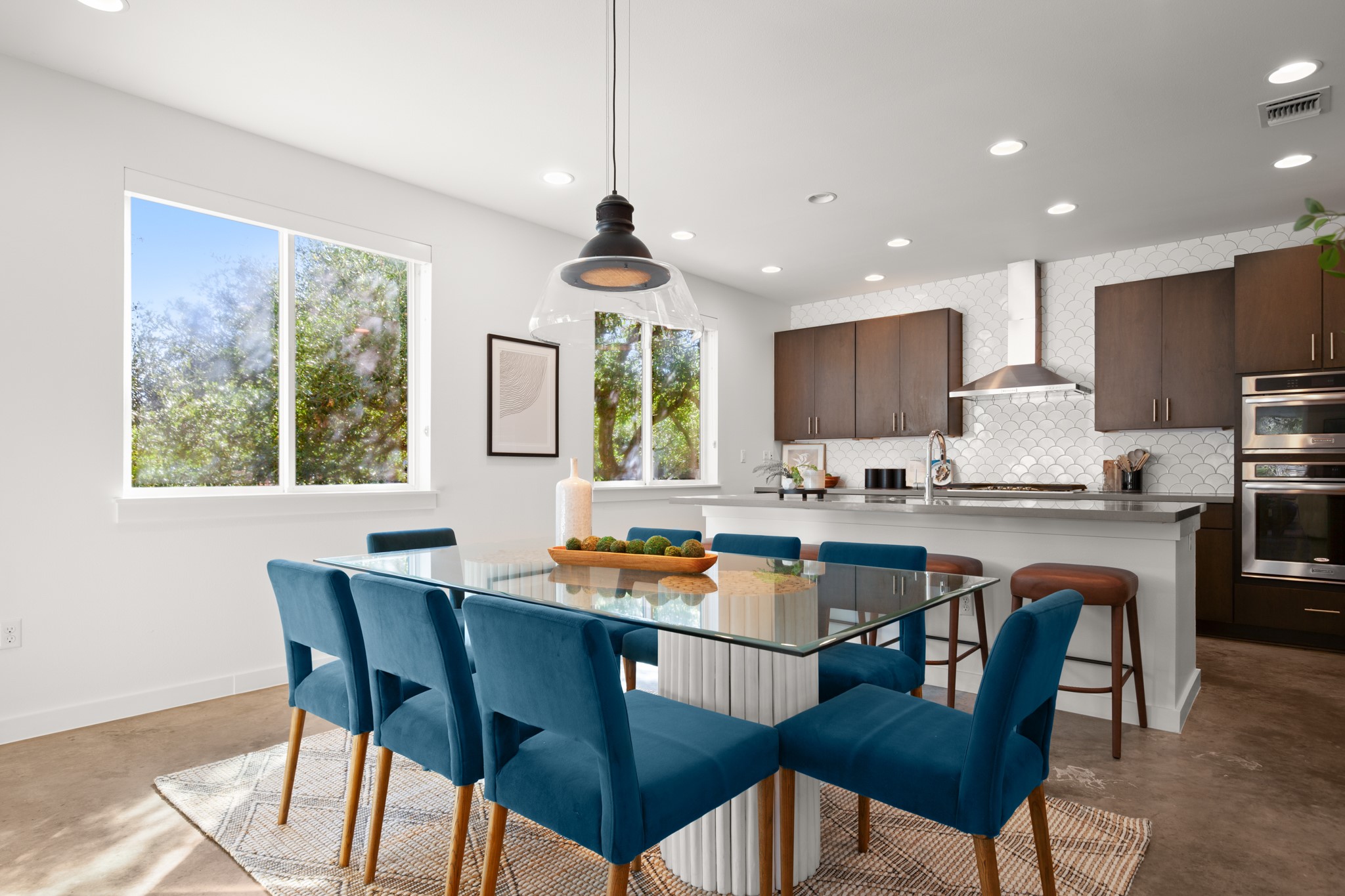 4111 Spicewood Springs Road, Unit 1 Austin, TX 78759 - Photo 9 of 31 Open concept dining and kitchen allows the space to feel cozy and connected