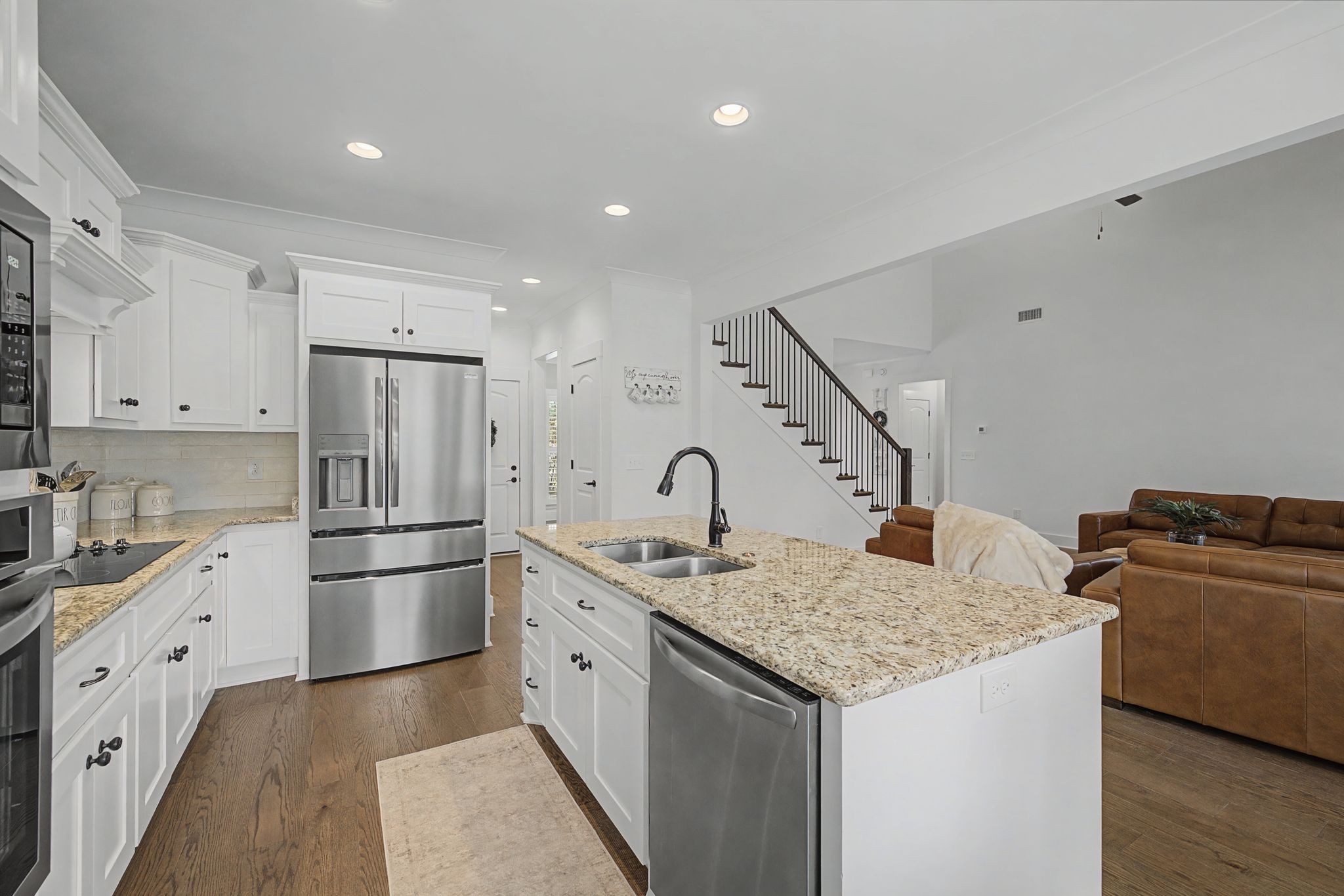 238 Hill Creek Road Woodbury, TN 37190 - Photo 12 of 40 a kitchen with stainless steel appliances granite countertop a sink stove and refrigerator