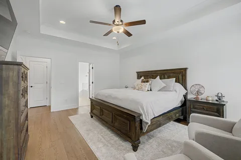 a bed room with a bed and a couch