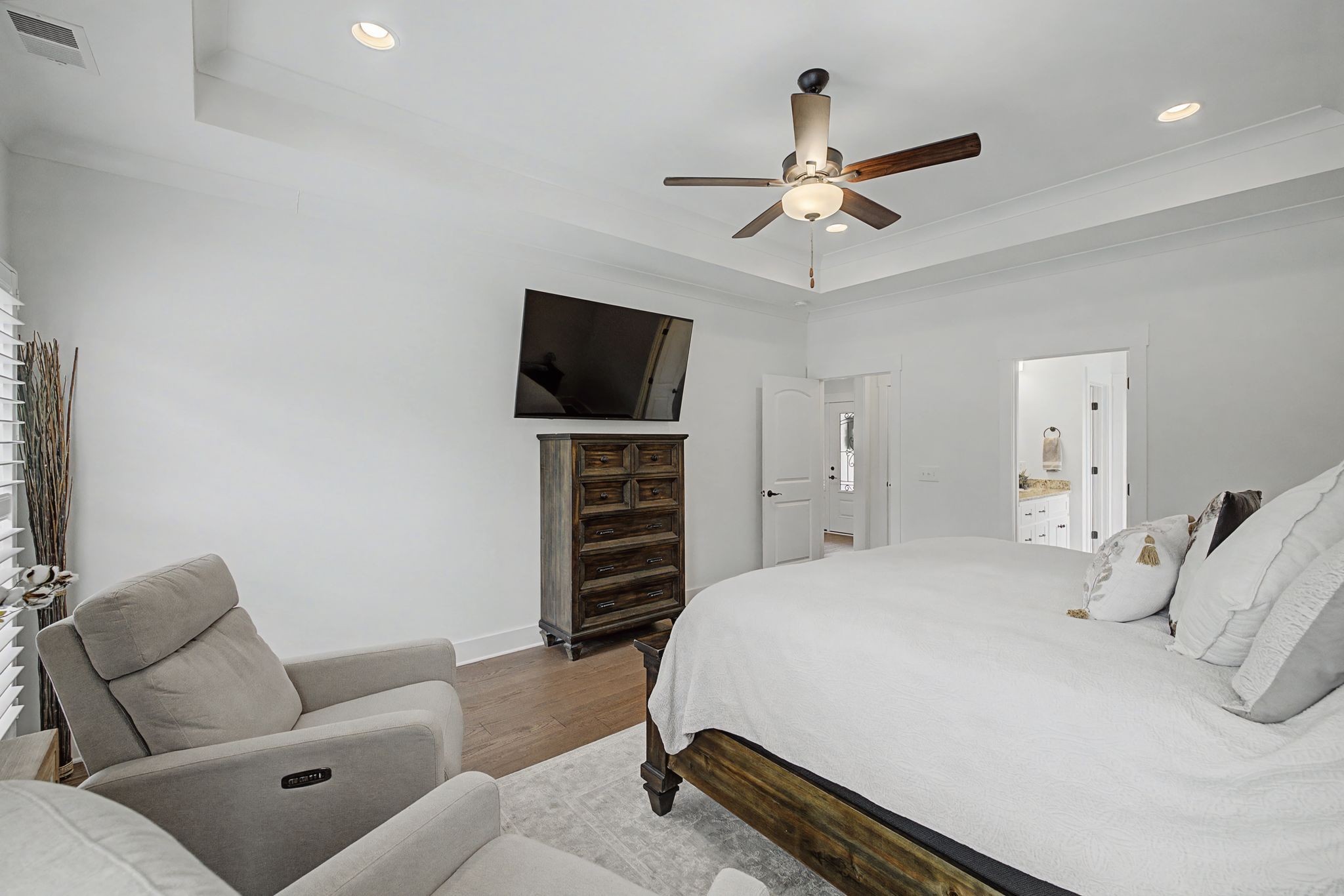 238 Hill Creek Road Woodbury, TN 37190 - Photo 18 of 40 a bedroom with a bed and a flat screen tv