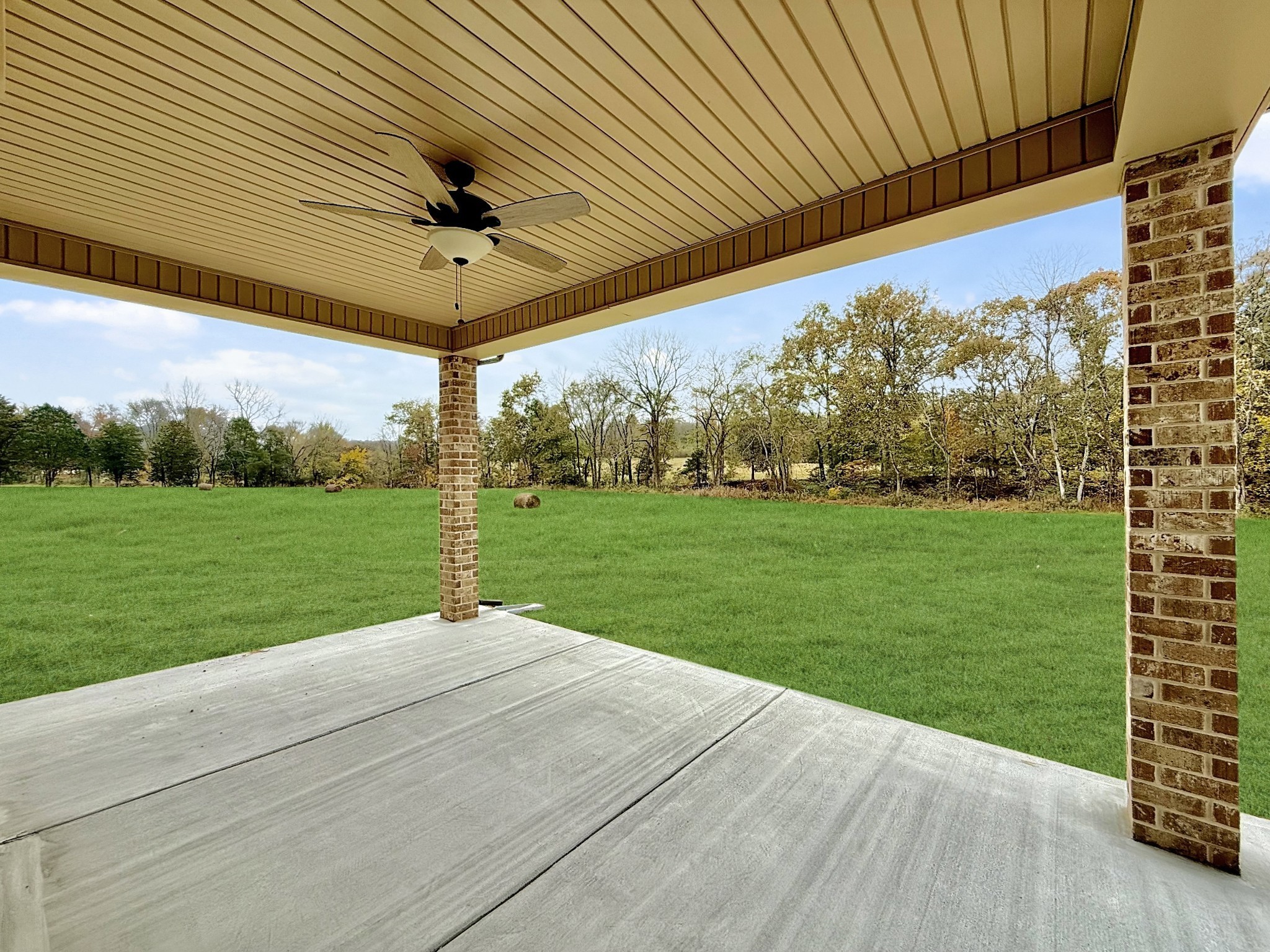 238 Hill Creek Road Woodbury, TN 37190 - Photo 36 of 40 a view of a backyard with a garden