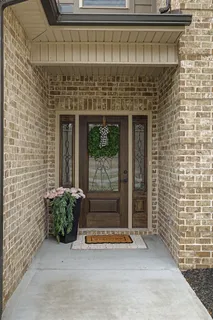 a view of entrance with an outdoor space