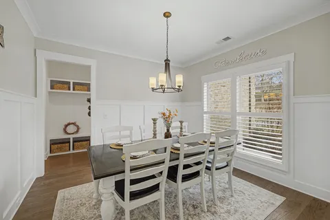 a view of a dining room with furniture