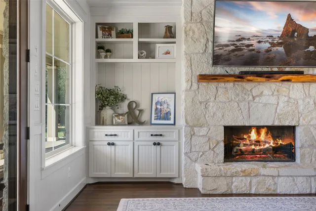 a living room with furniture and a rug