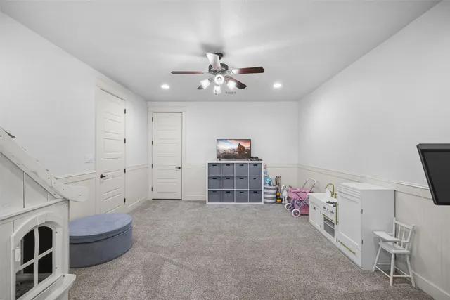 a utility room with sink dryer and washer