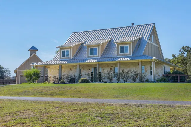 a view of a house with a swimming pool