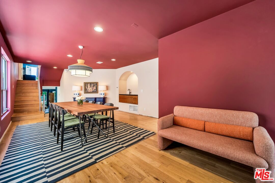 679 Washington Boulevard Marina del Rey, CA 90292 - Photo 16 of 37 a living room with furniture and a wooden floor