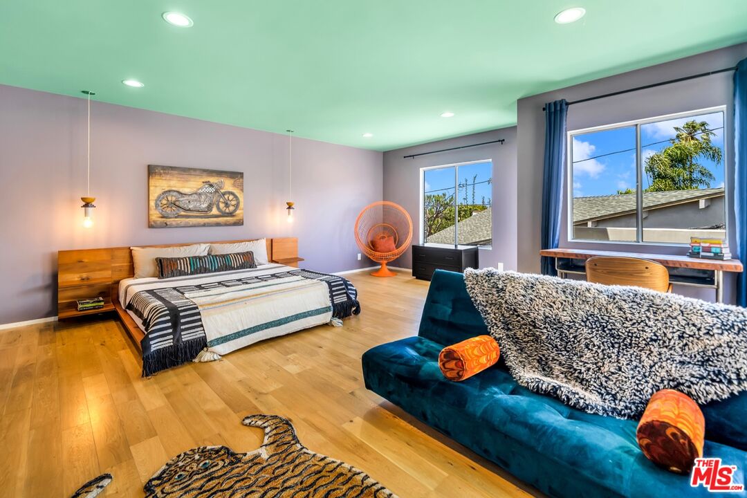 679 Washington Boulevard Marina del Rey, CA 90292 - Photo 29 of 37 a bedroom with furniture and a large window