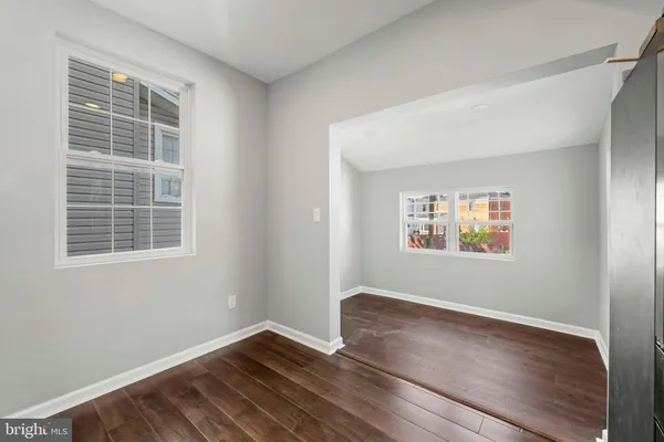 a view of bathroom with a toilet sink bath tub and shower
