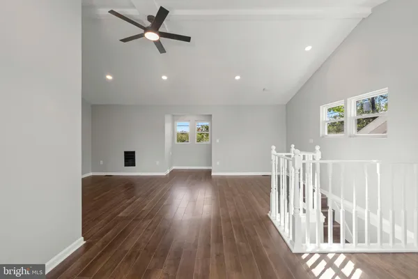 a kitchen with a sink stove and refrigerator