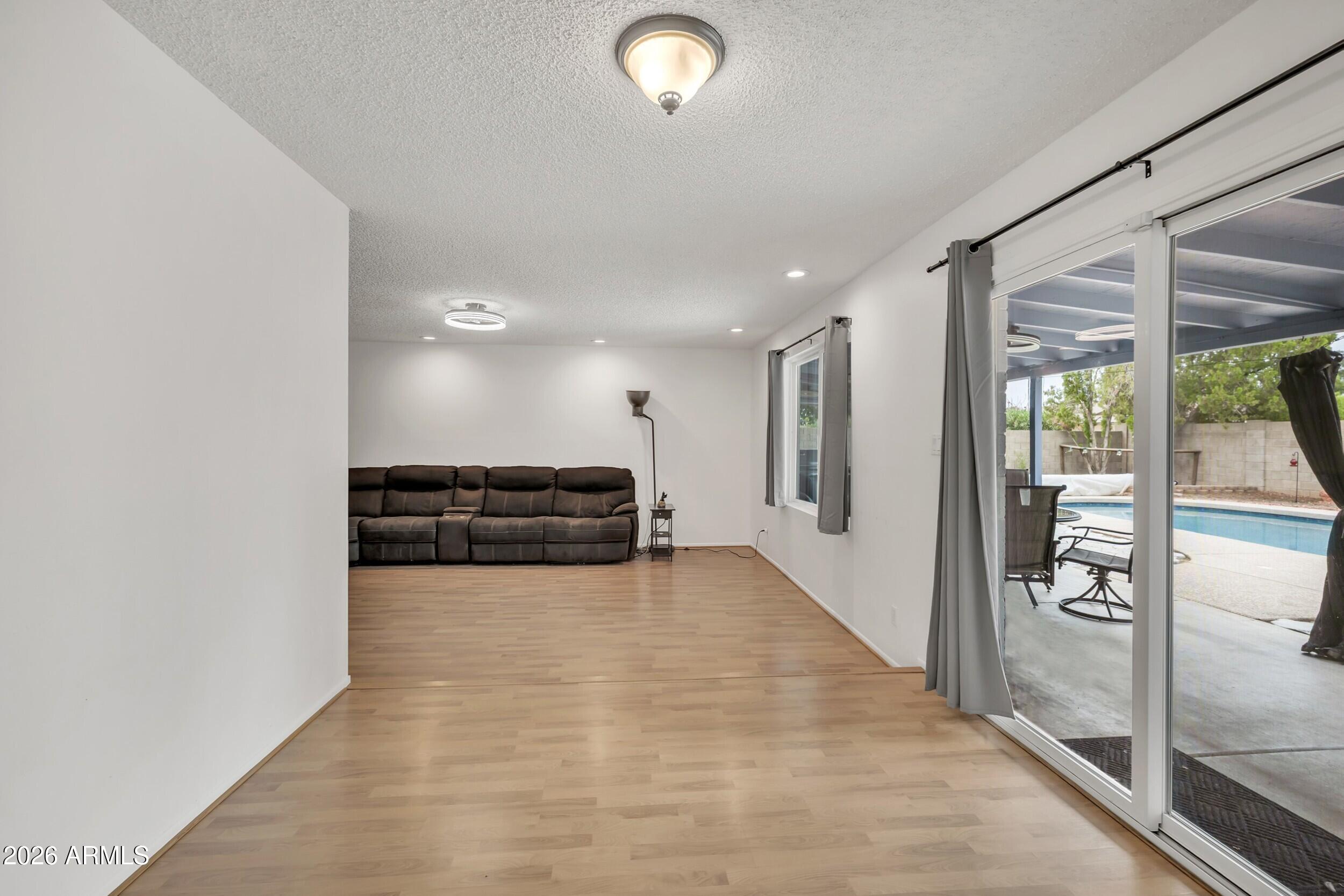 3833 West Phelps Road Phoenix, AZ 85053 - Photo 14 of 55 Dining Room toward Living Room
