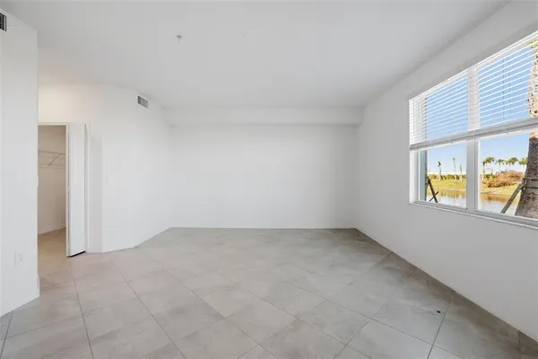 an empty room with windows