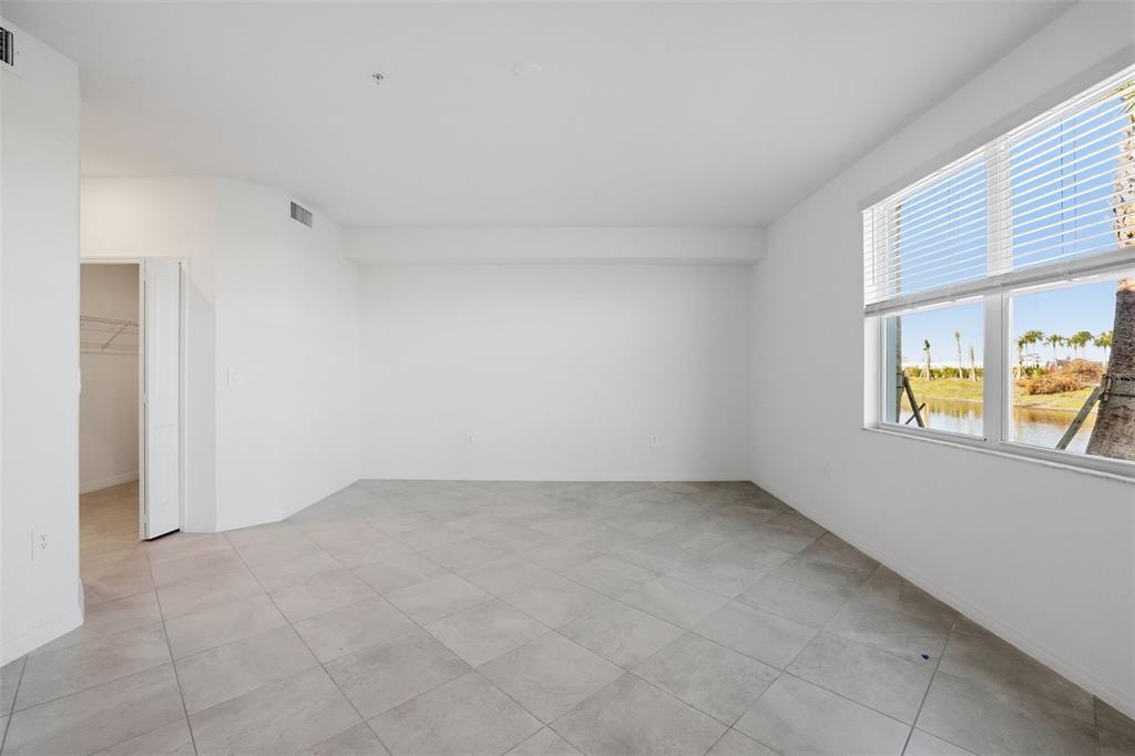 19227 Cherrystone Way, Unit 101 Lakewood Ranch, FL 34211 - Photo 11 of 19 an empty room with windows