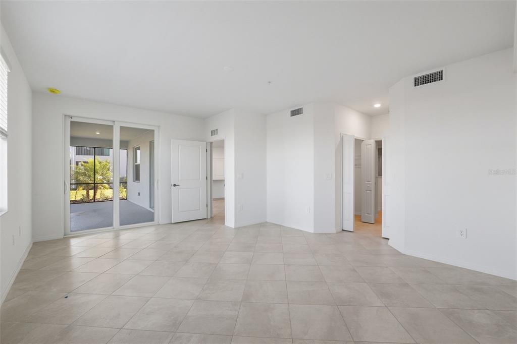 19227 Cherrystone Way, Unit 101 Lakewood Ranch, FL 34211 - Photo 10 of 19 a view of an empty room with a window