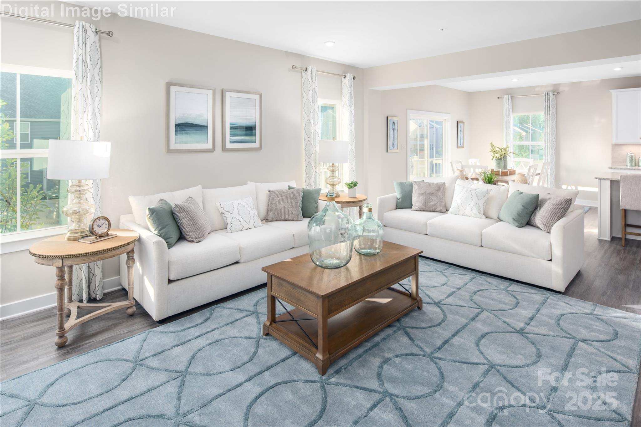 6334 Durango Way Denver, NC 28037 - Photo 3 of 22 a living room with furniture a large window and a table