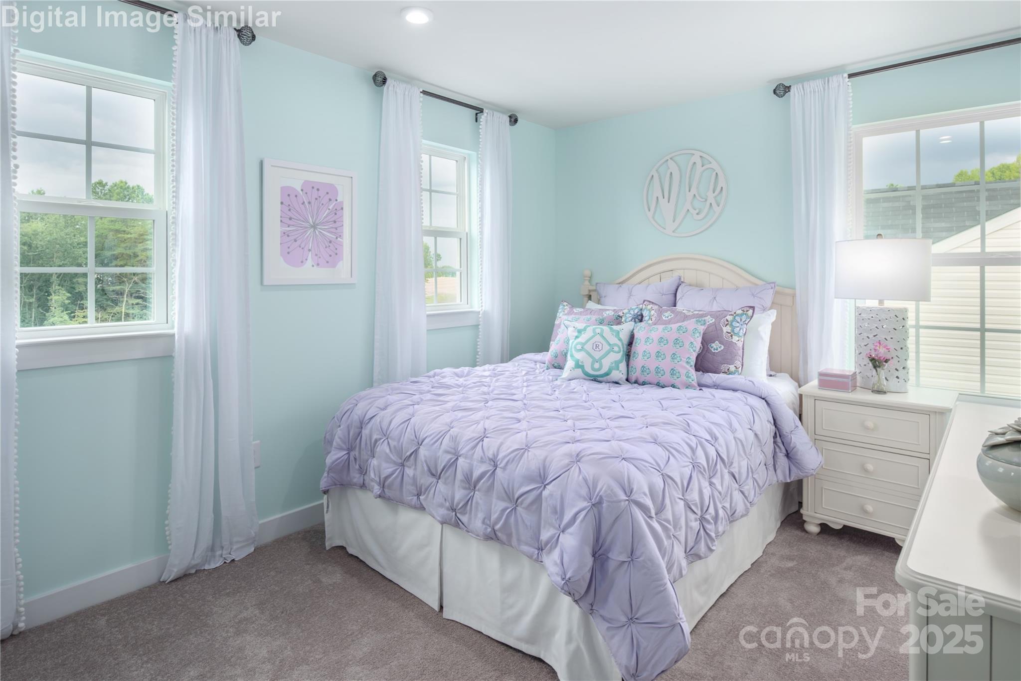 6334 Durango Way Denver, NC 28037 - Photo 8 of 22 a bedroom with a bed and a window