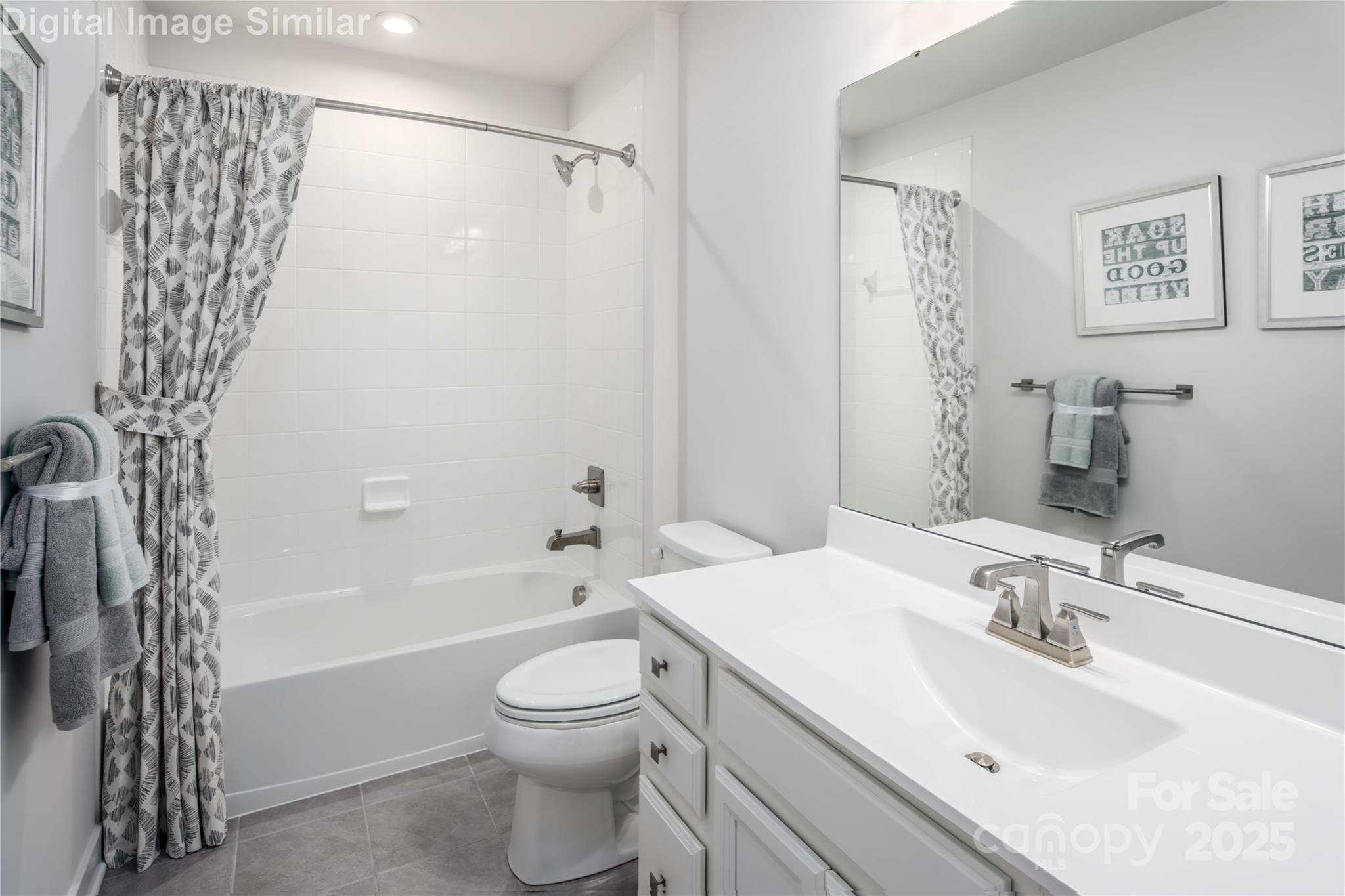 6334 Durango Way Denver, NC 28037 - Photo 10 of 22 a bathroom with a sink a toilet and shower