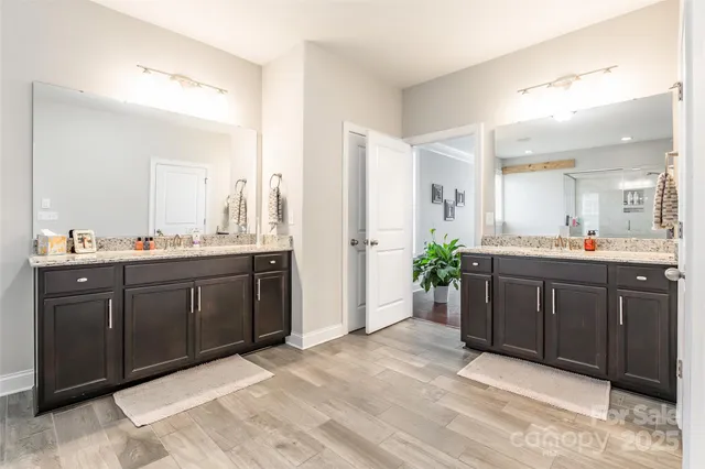 a bathroom with a shower and a bathtub