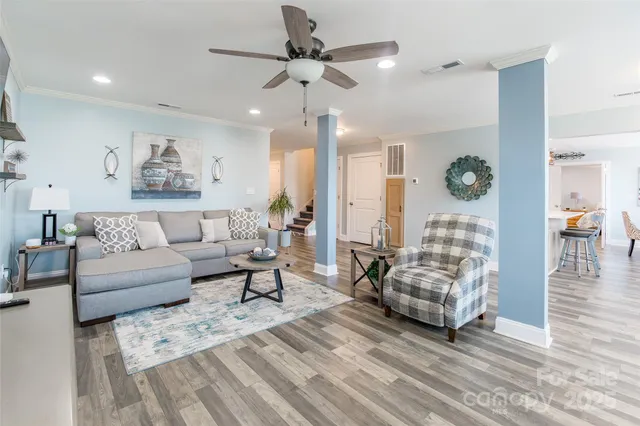 a view of kitchen with cabinets table and chairs