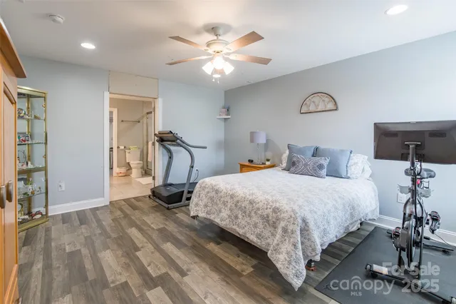 a bathroom with bathtub and shower