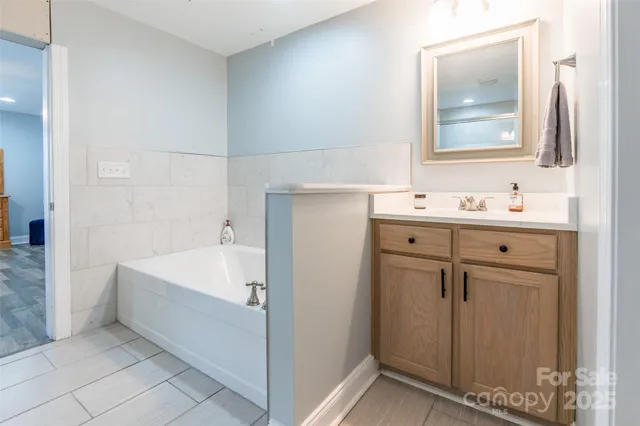 a bathroom with a shower and toilet