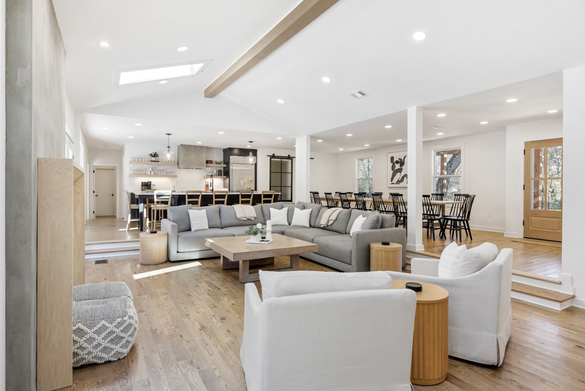 270 Hurt Road Hendersonville, TN 37075 - Photo 14 of 68 a living room with couches and kitchen view with wooden floor