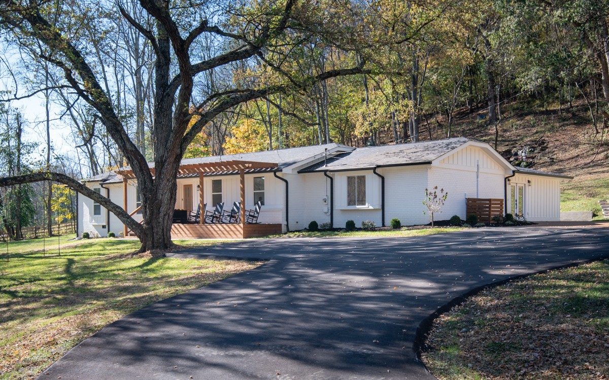270 Hurt Road Hendersonville, TN 37075 - Photo 2 of 68 a house that has a tree in front of it
