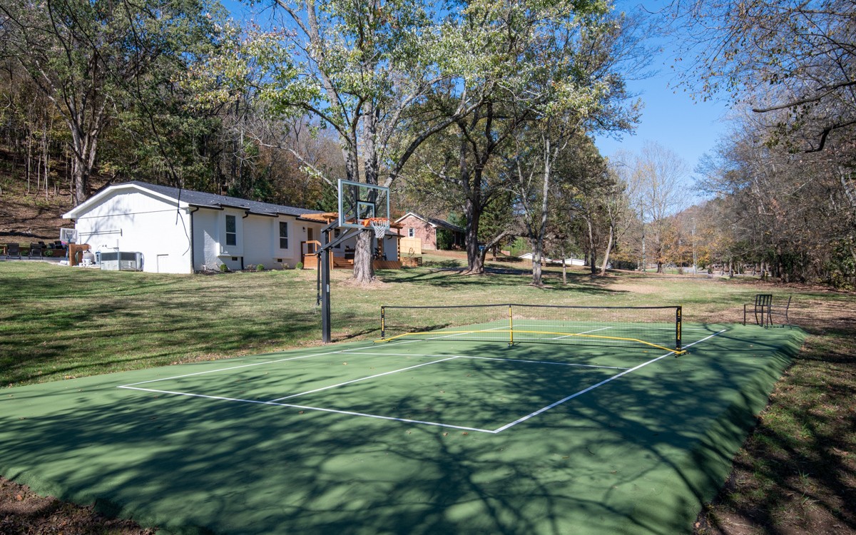 270 Hurt Road Hendersonville, TN 37075 - Photo 3 of 68 a view of a house with a big yard and large trees