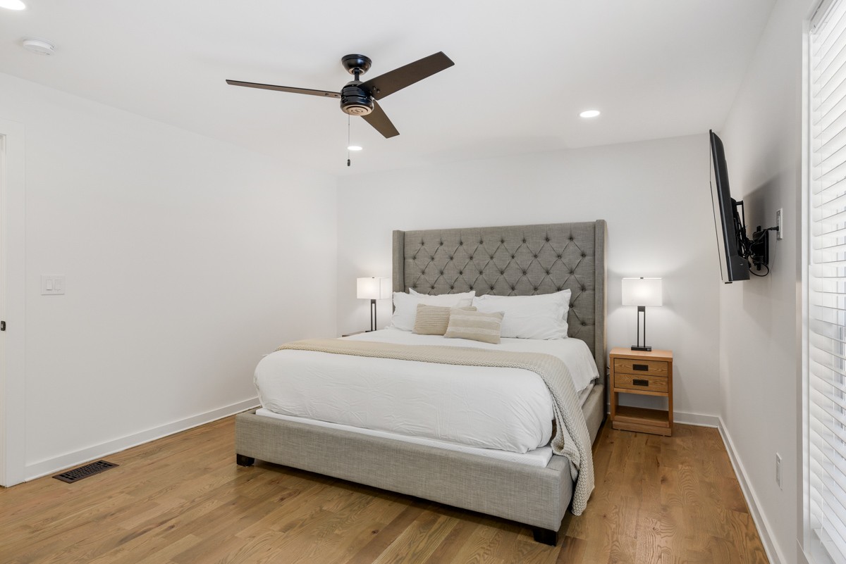 270 Hurt Road Hendersonville, TN 37075 - Photo 33 of 68 a bedroom with a bed and a flat screen tv