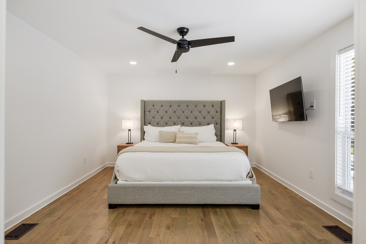 270 Hurt Road Hendersonville, TN 37075 - Photo 34 of 68 a bedroom with a bed and a flat screen tv