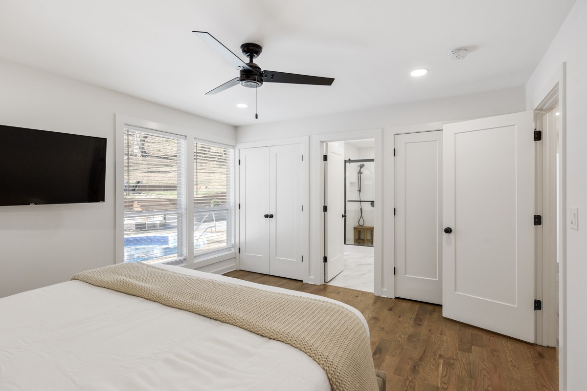 270 Hurt Road Hendersonville, TN 37075 - Photo 35 of 68 a bedroom with a bed tv and a window