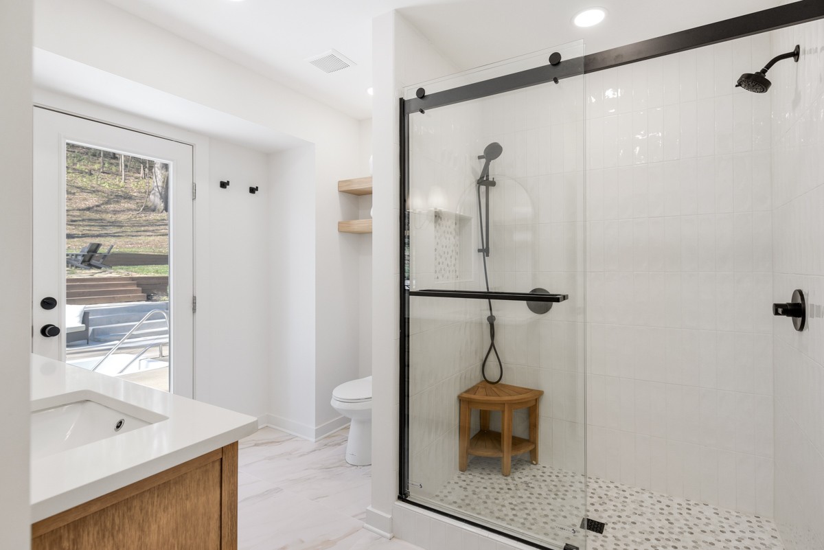 270 Hurt Road Hendersonville, TN 37075 - Photo 36 of 68 a bathroom with a sink a toilet and shower