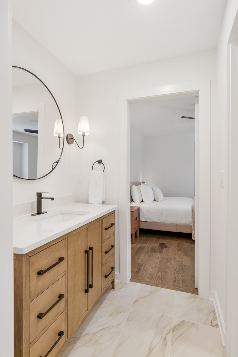 270 Hurt Road Hendersonville, TN 37075 - Photo 39 of 68 a en suite bathroom with a granite countertop sink and a mirror