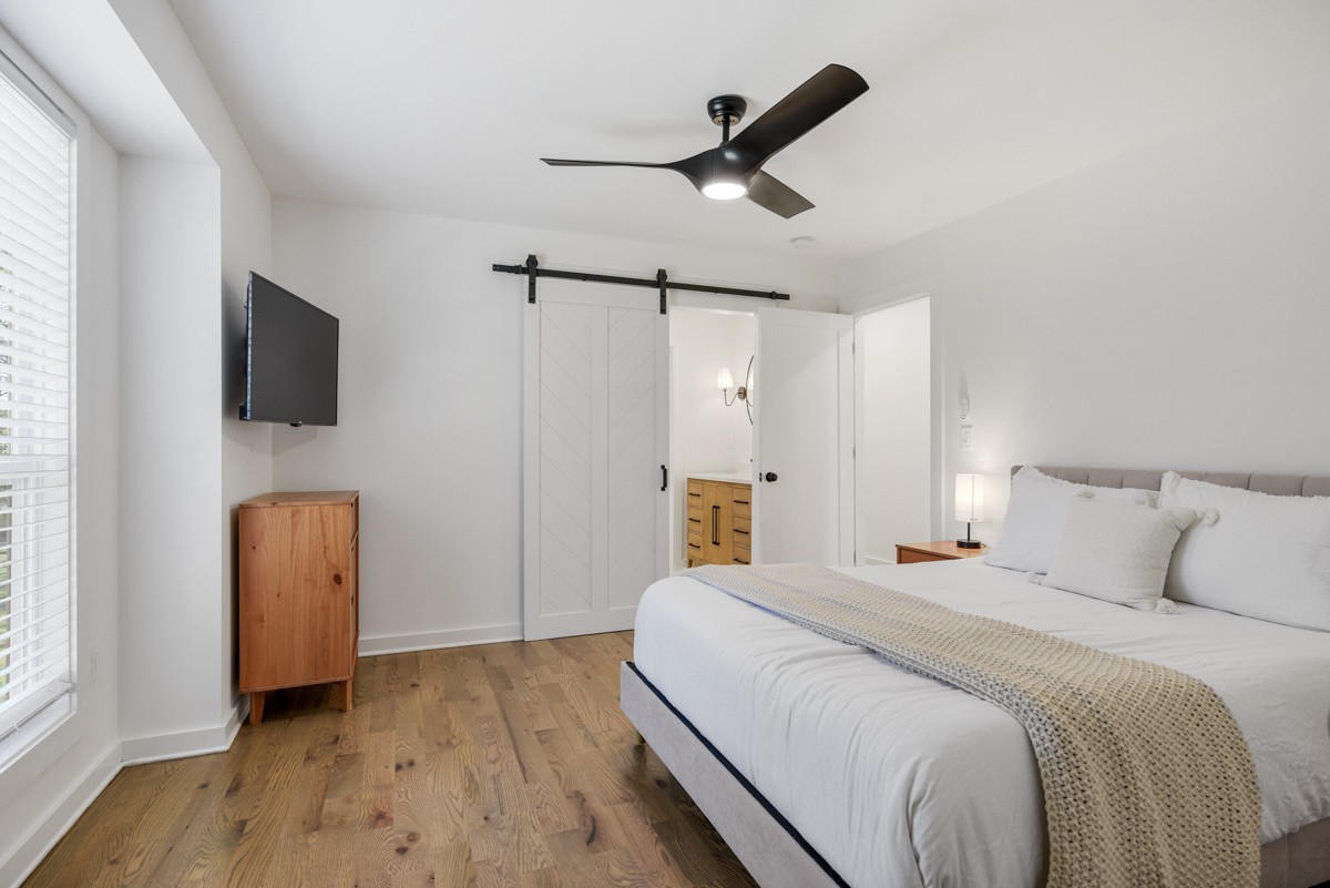 270 Hurt Road Hendersonville, TN 37075 - Photo 42 of 68 a bedroom with a bed a flat screen tv and dresser