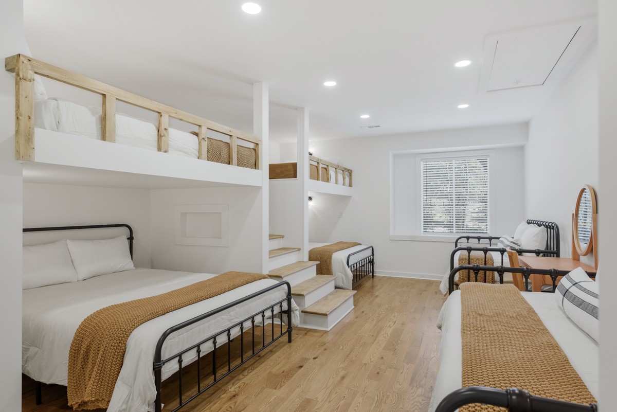 270 Hurt Road Hendersonville, TN 37075 - Photo 45 of 68 a bedroom with a bed and wooden floor