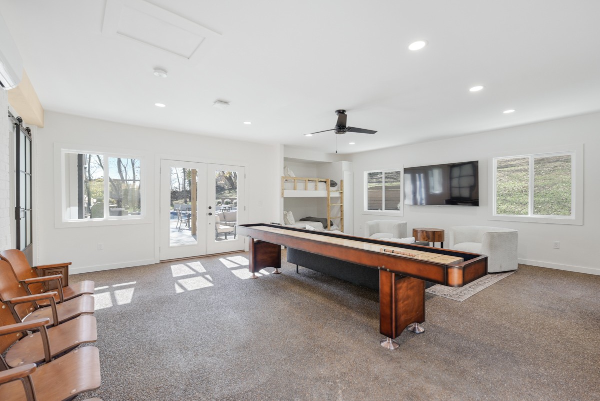 270 Hurt Road Hendersonville, TN 37075 - Photo 48 of 68 a living room with furniture and a flat screen tv
