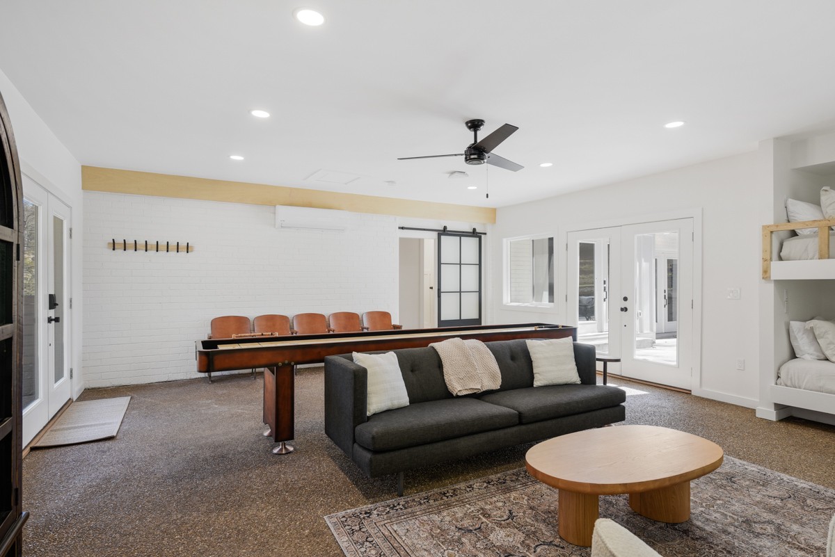 270 Hurt Road Hendersonville, TN 37075 - Photo 50 of 68 a living room with furniture and a rug