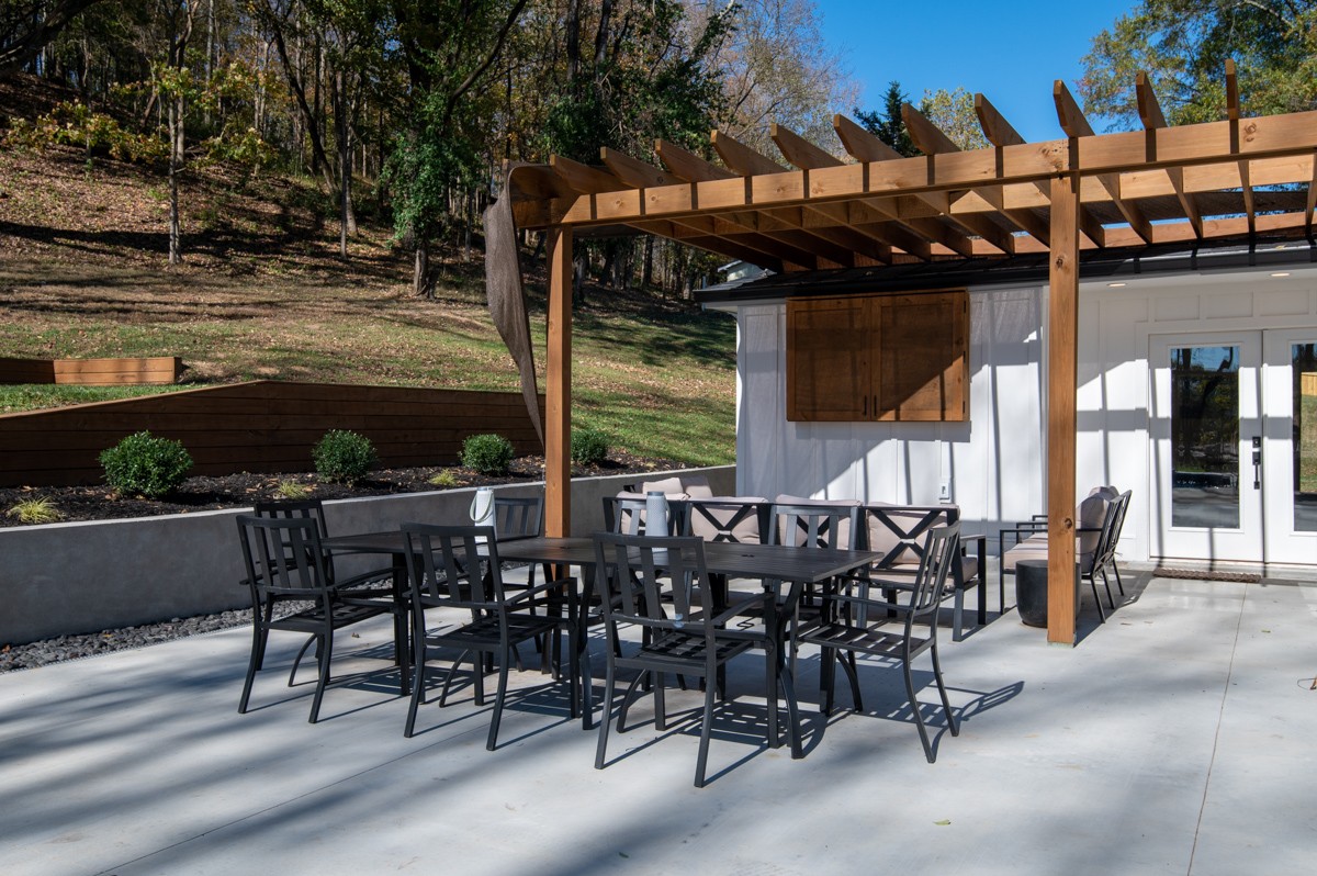 270 Hurt Road Hendersonville, TN 37075 - Photo 56 of 68 a view of a patio with table and chairs and potted plants
